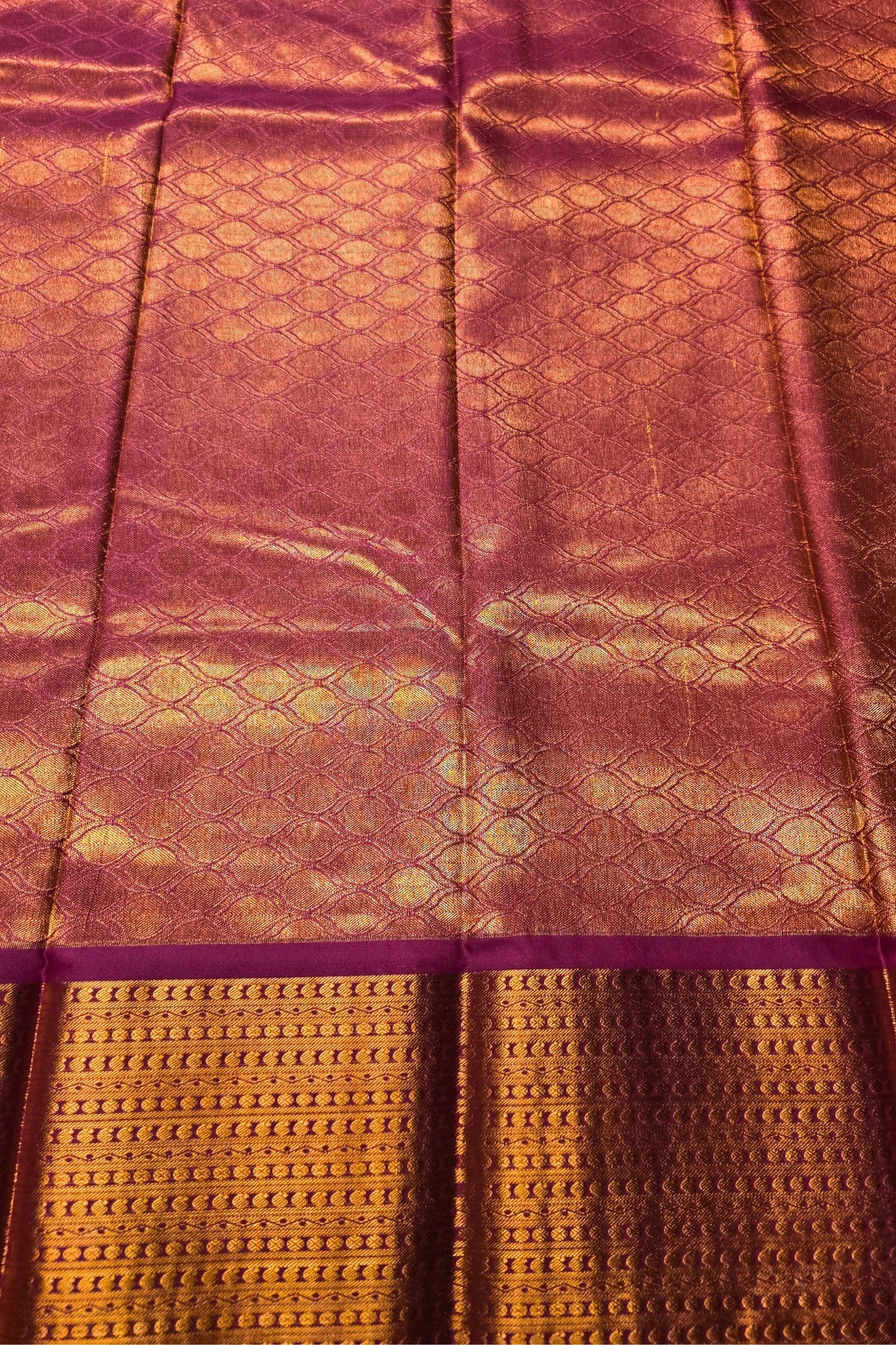Elegant Dark Green Kanjipuram Silk Saree with Contrasting Pink Border