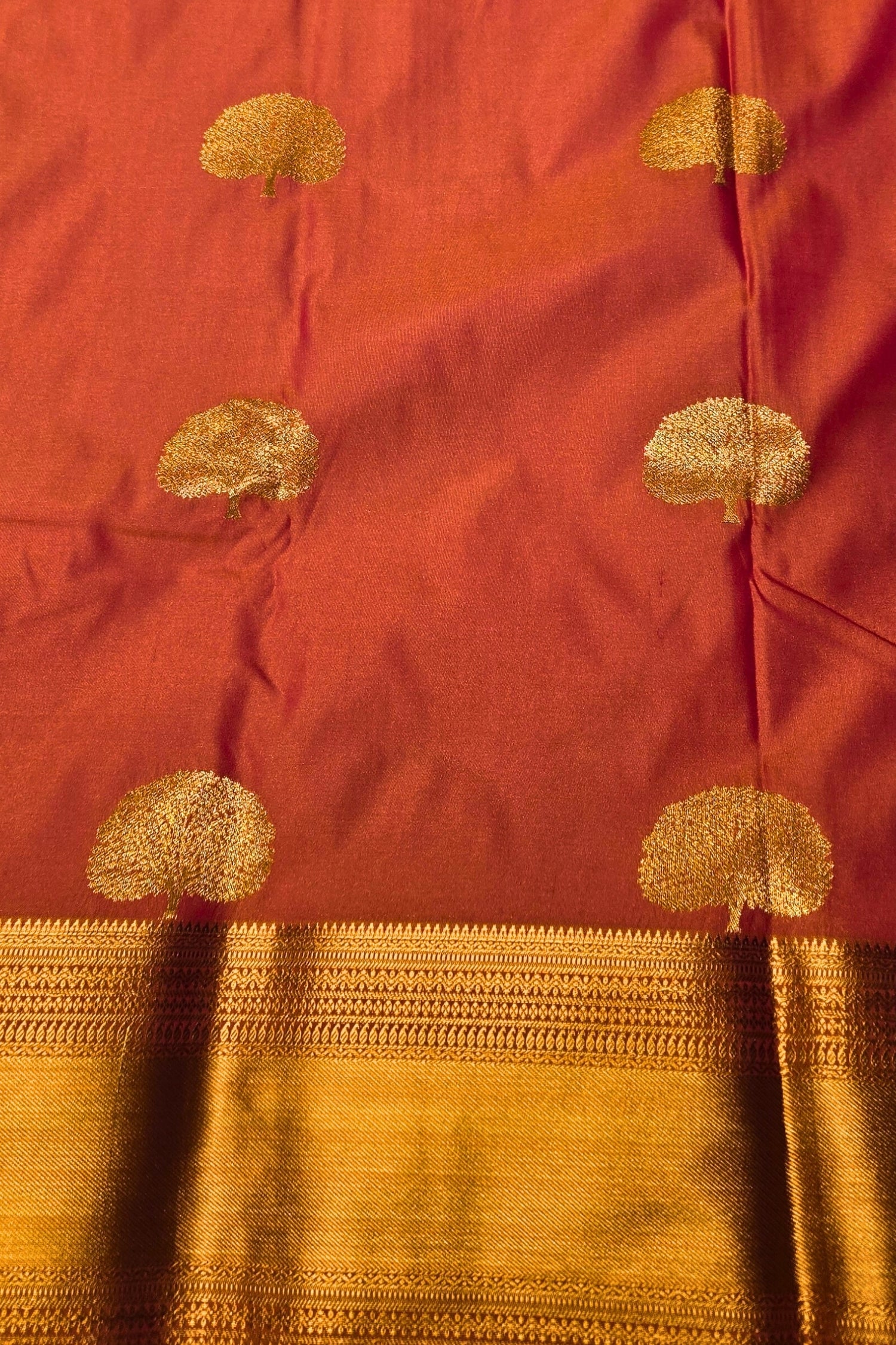 Red fabric with gold patterns