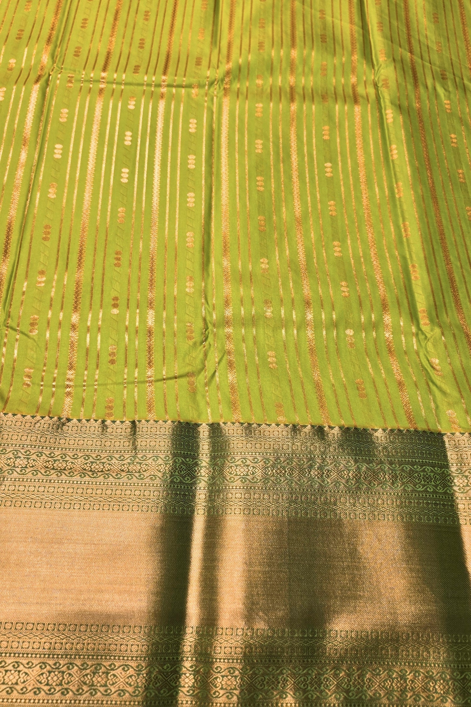 Graceful Light Green Semi Kanjipuram Silk Saree with Dark Green Border