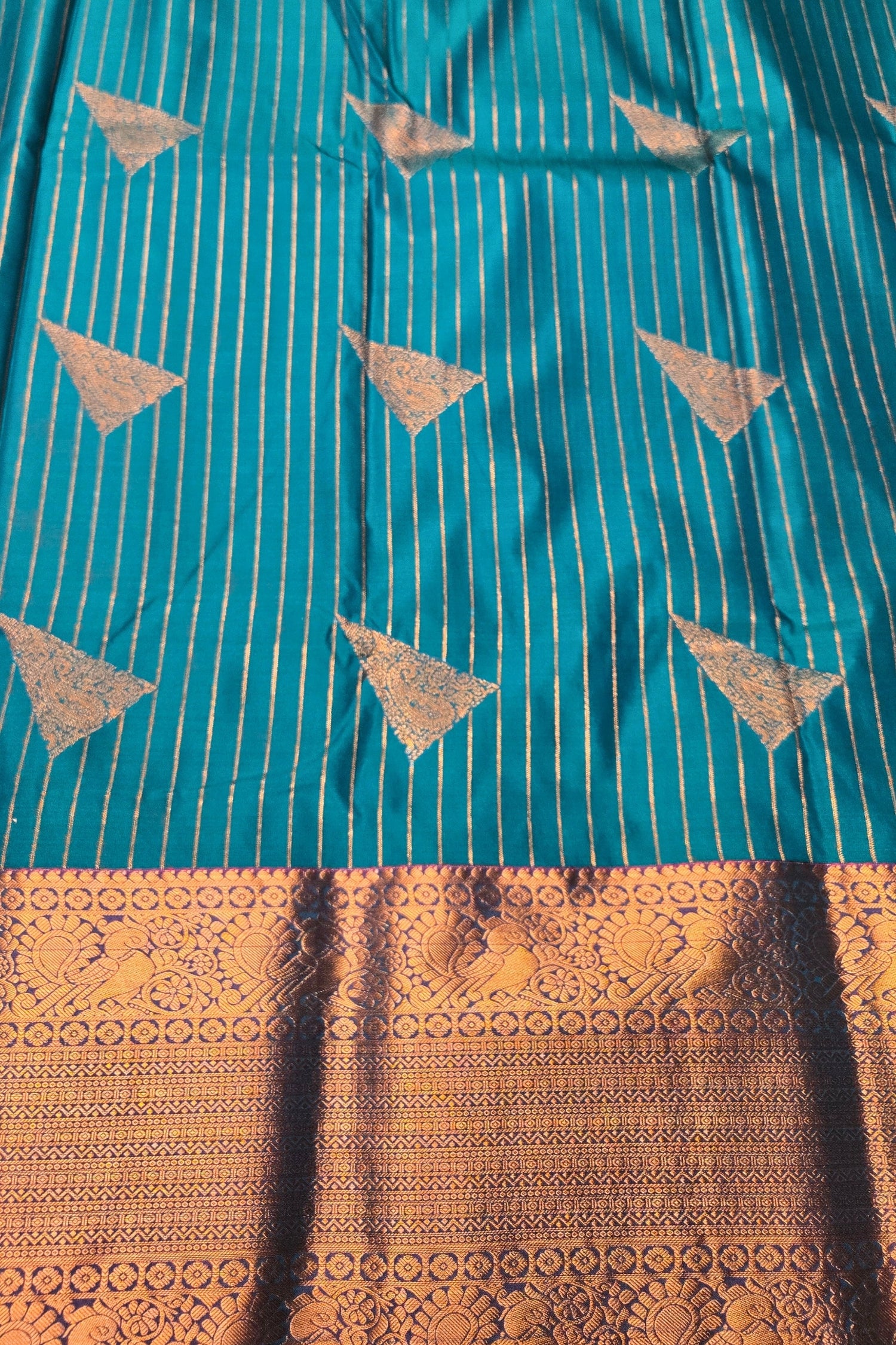 Graceful Light Blue Semi Kanchi Silk Saree with Pink Border