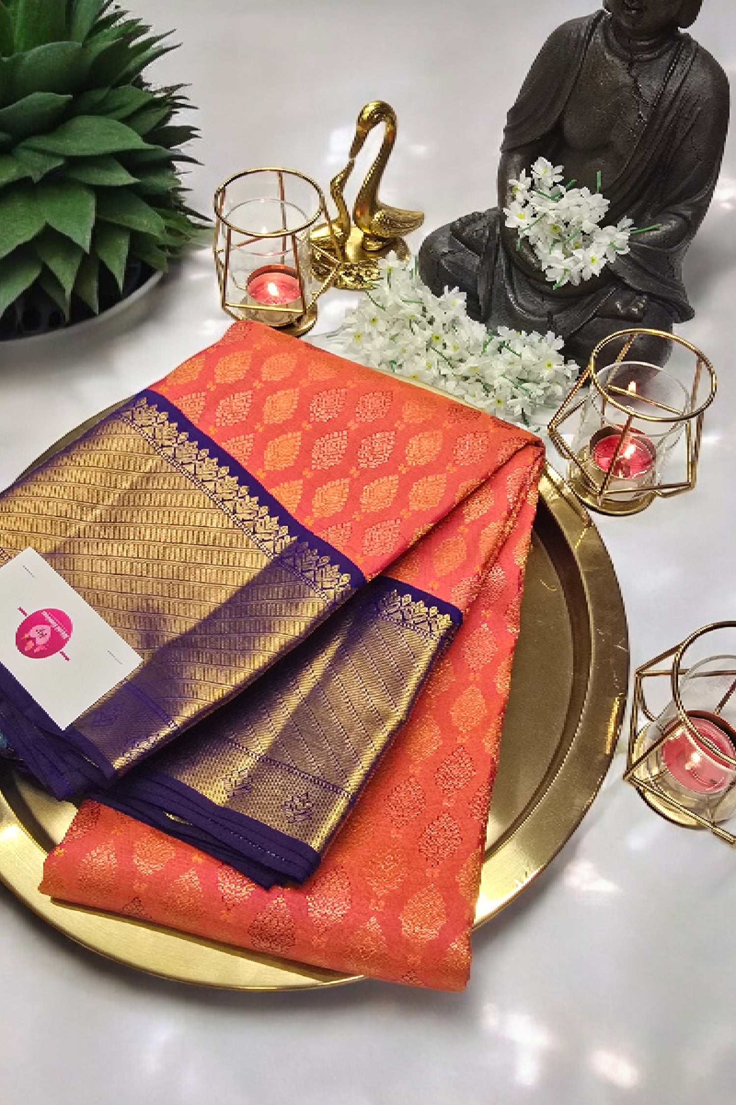 Orange Kanchipuram Saree with Bright Blue Border
