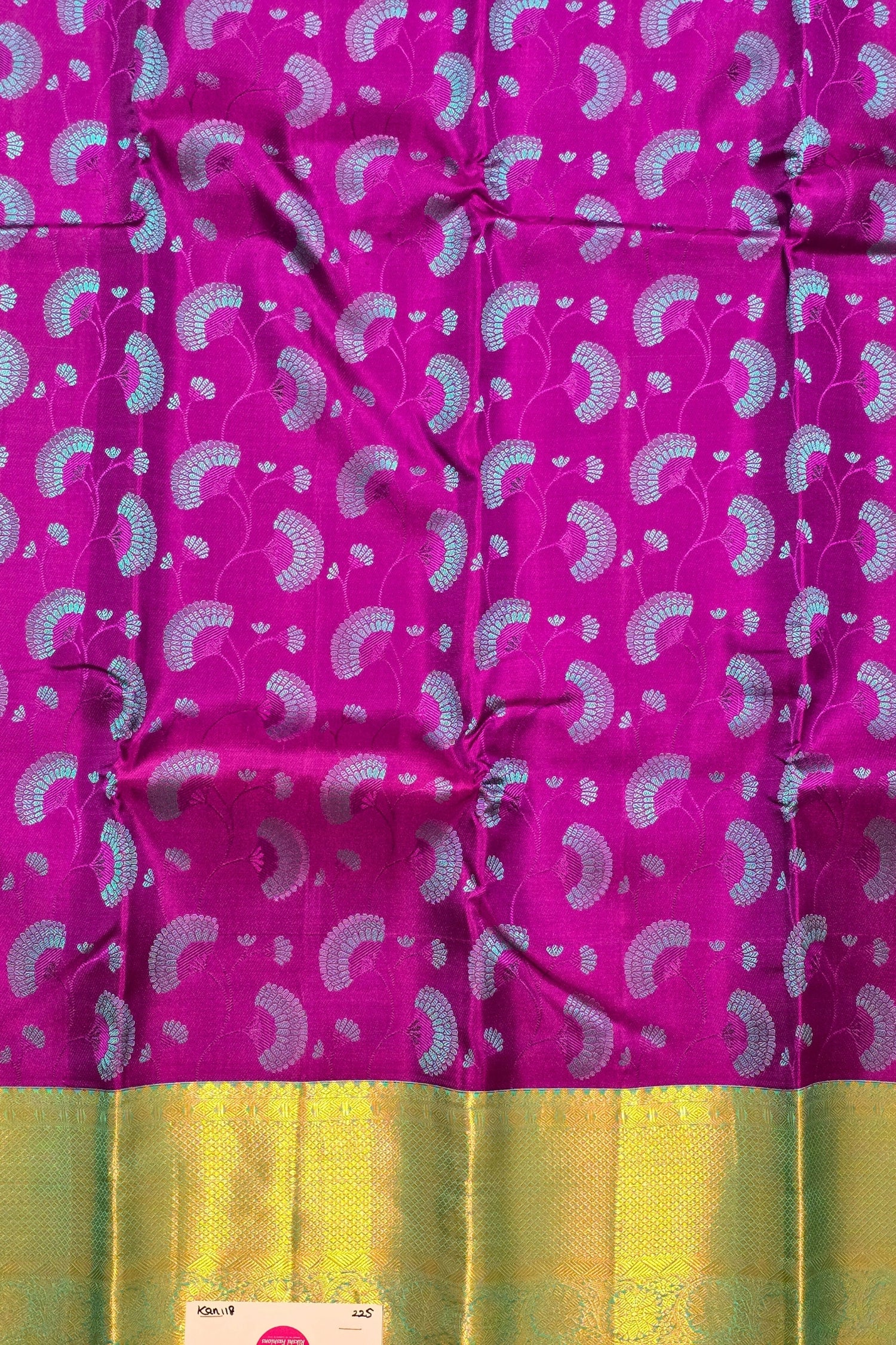 Fabric with pink and green patterned design