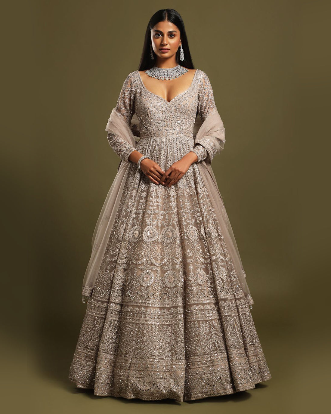 Choosing Bridal Attire: Gowns vs. Lehengas in 2025