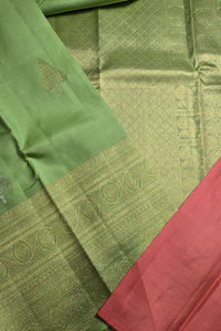 Green and red fabric with intricate patterns