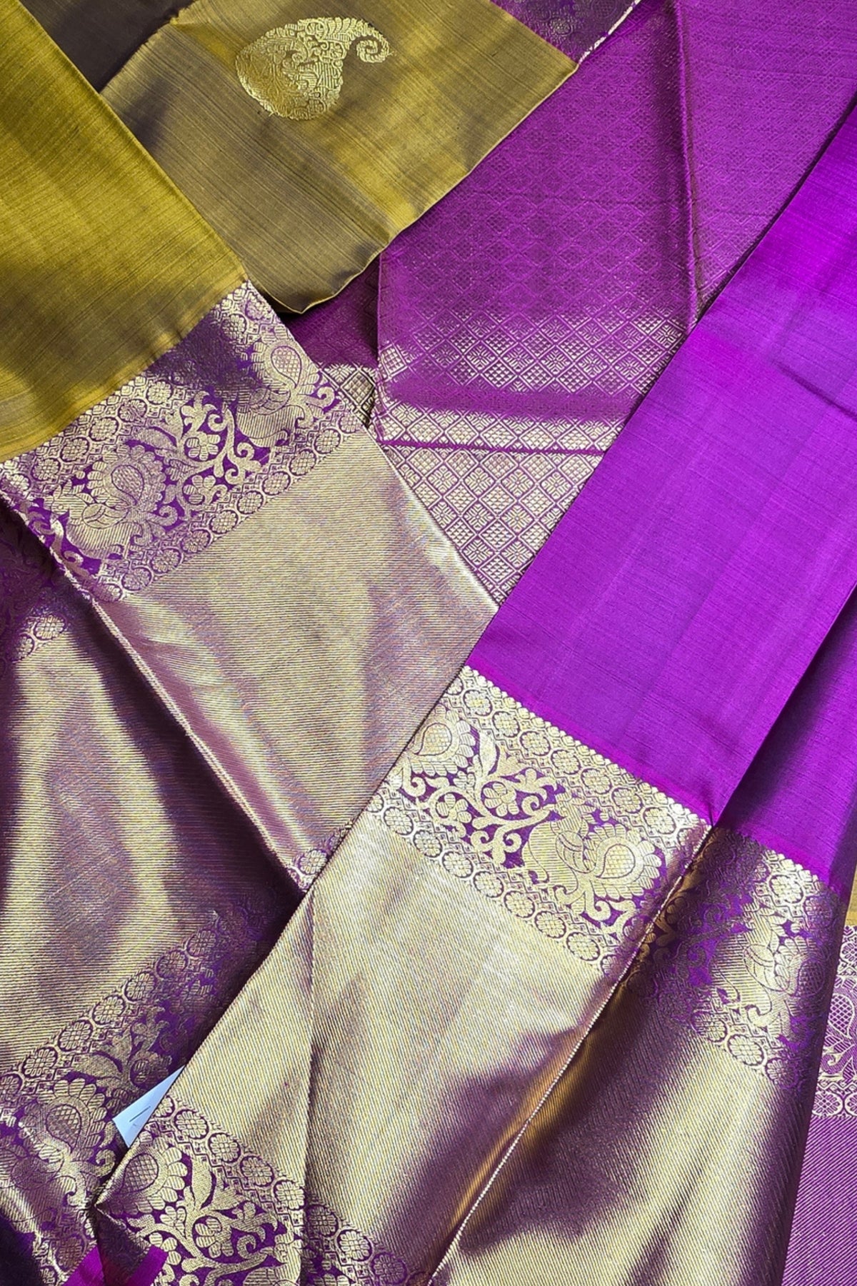 Purple and gold fabric with intricate patterns