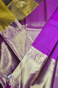 Purple and gold fabric with intricate patterns