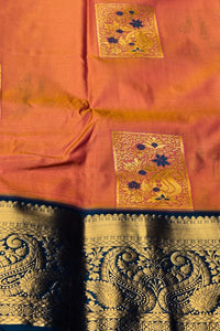 Orange fabric with gold and black embroidery