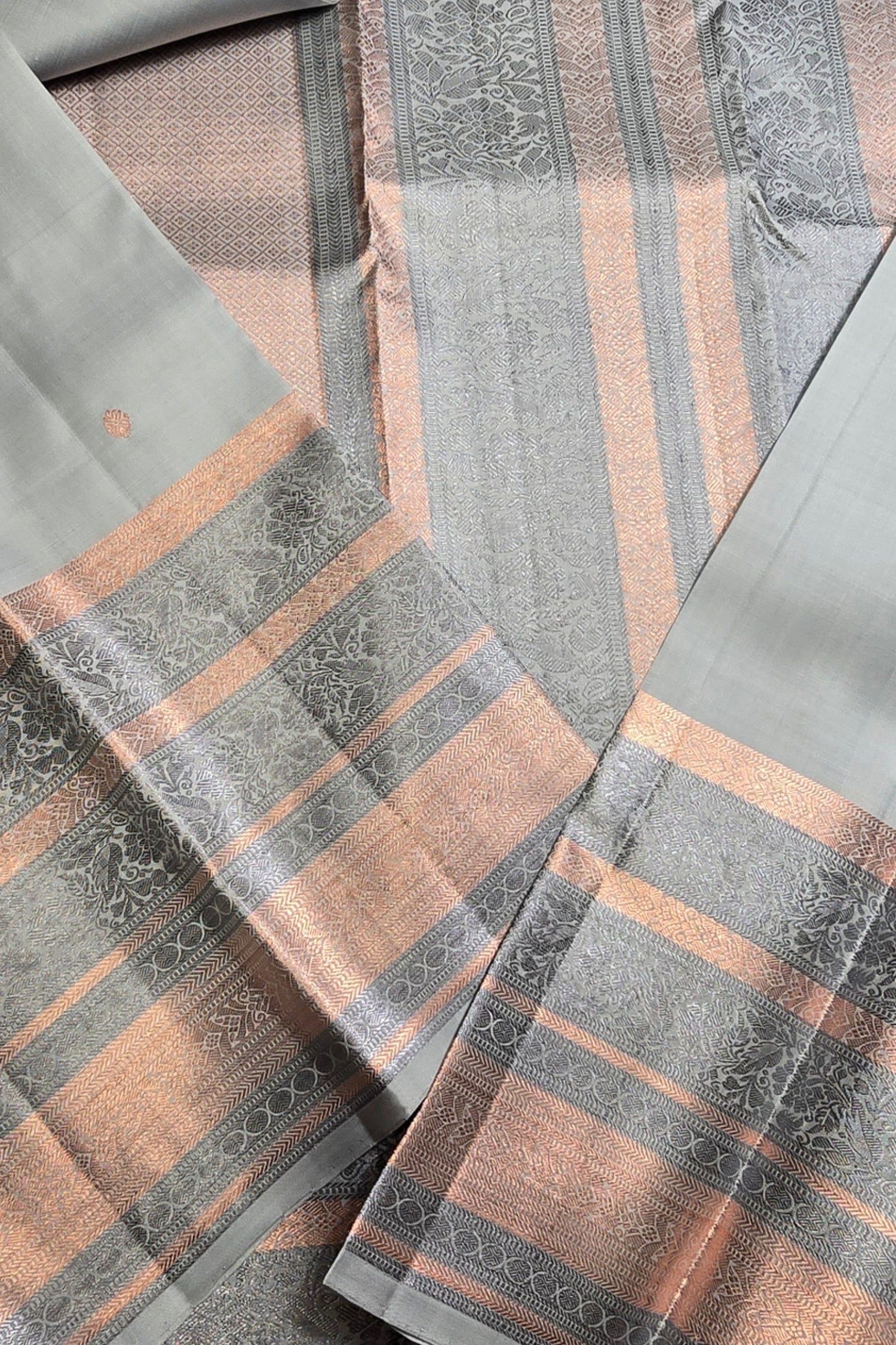 Close-up of patterned fabric with brown and gray stripes