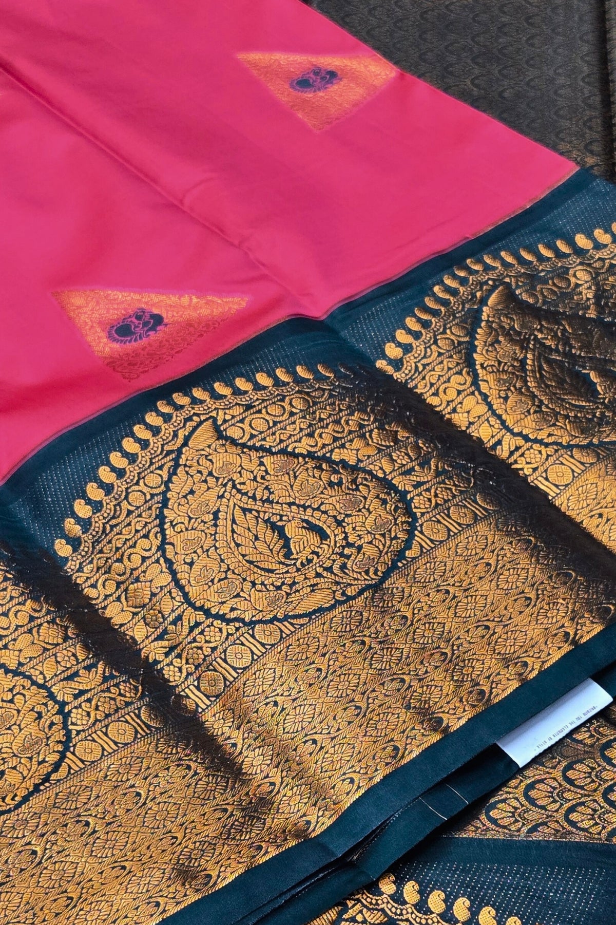 Pink and black saree with gold embroidery
