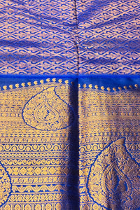 Close-up of a blue and gold patterned fabric