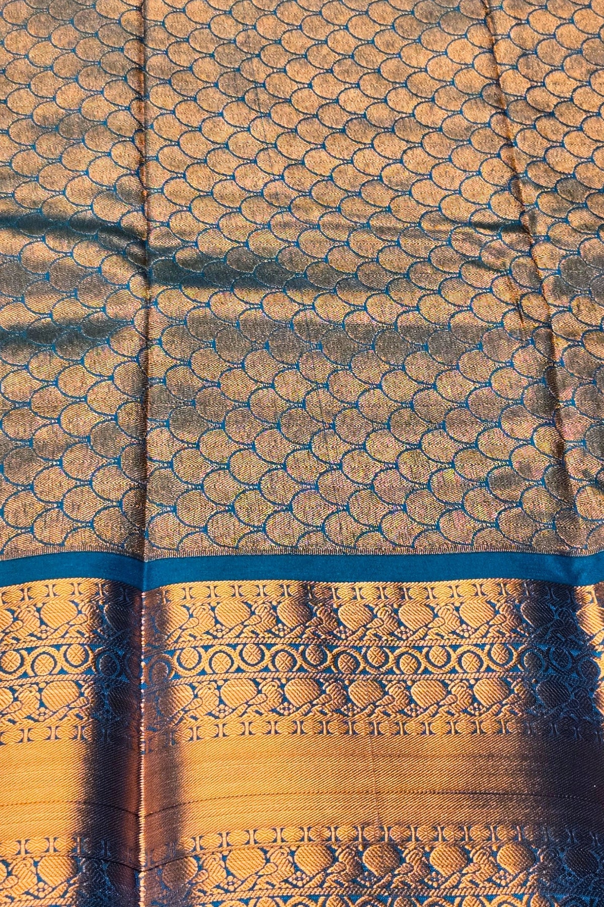Vibrant Orange Semi Kanchi Silk Saree with Sky Blue Border