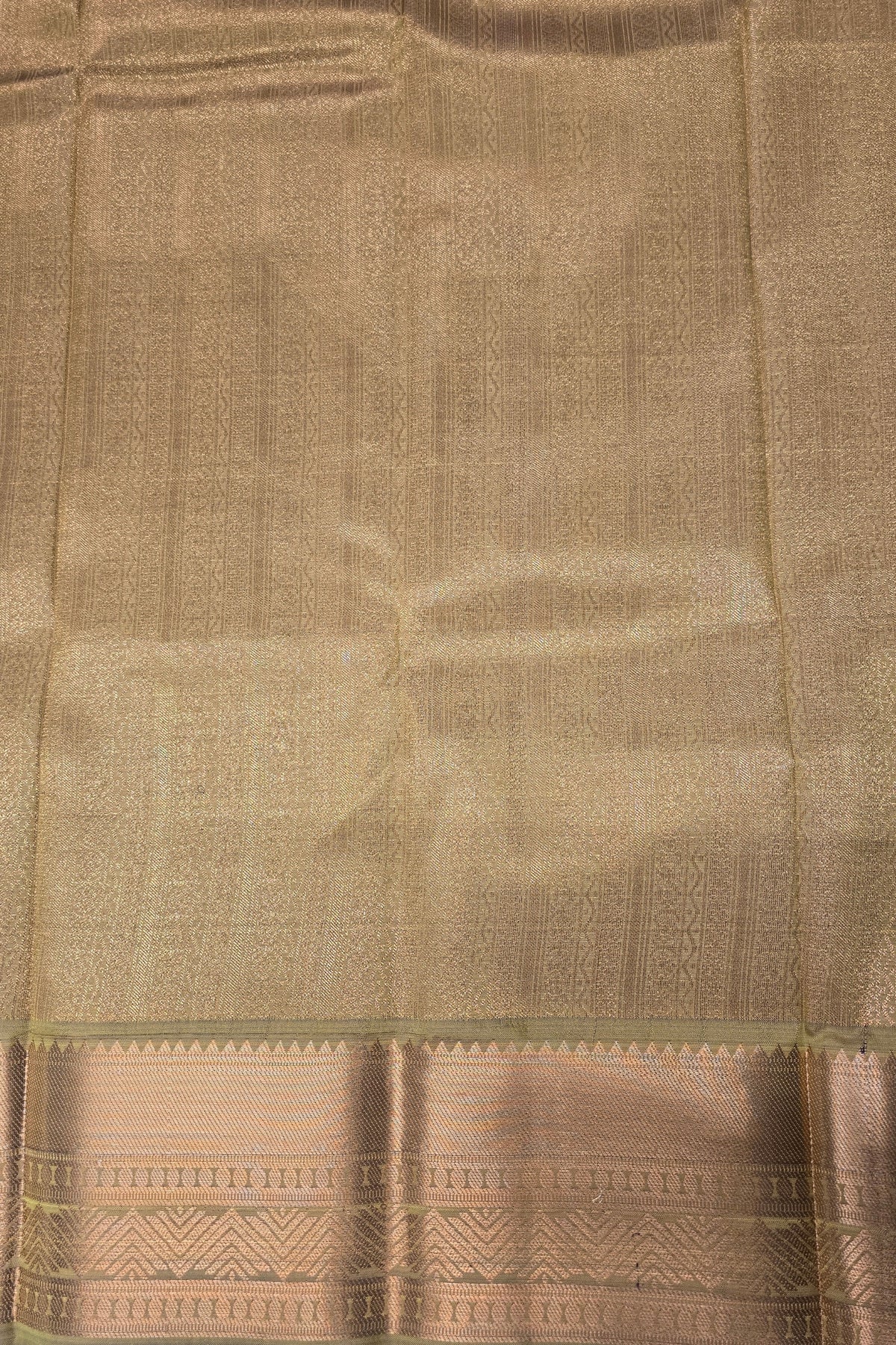 Brown fabric with a subtle pattern and border