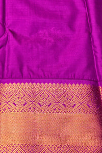 Purple and orange fabric with a decorative border