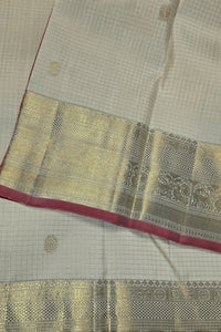 White Kanchipuram Silk Saree with Gold Border and Red Pallu