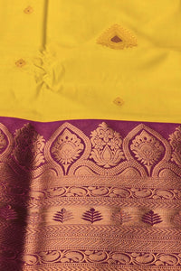 Radiant Yellow Semi Kanchi Silk Saree with Pink Border