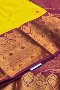 Radiant Yellow Semi Kanchi Silk Saree with Pink Border