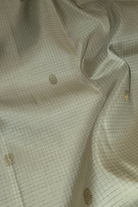 White Kanchipuram Silk Saree with Gold Border and Red Pallu