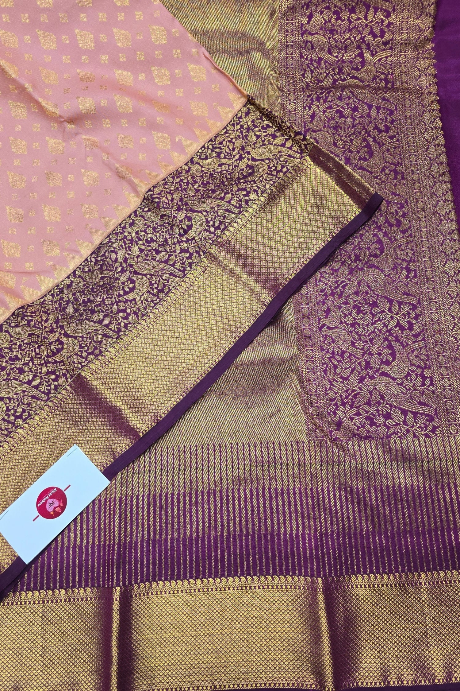 Graceful Pink Kanchipuram Silk Saree with Regal Purple Border