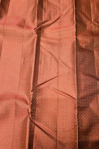 Close-up of a textured brown fabric with a pattern