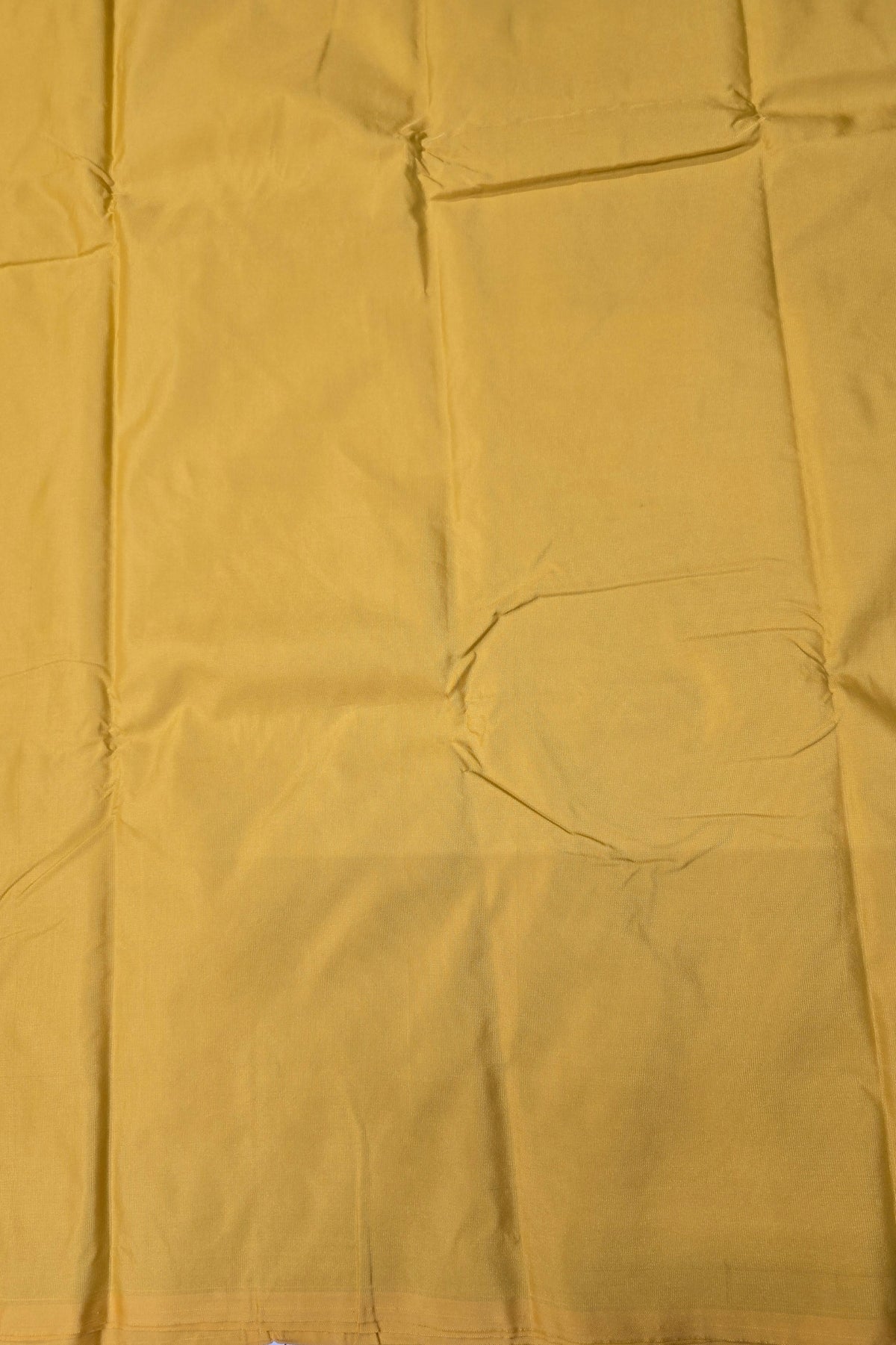 Close-up of a yellow fabric with a pocket