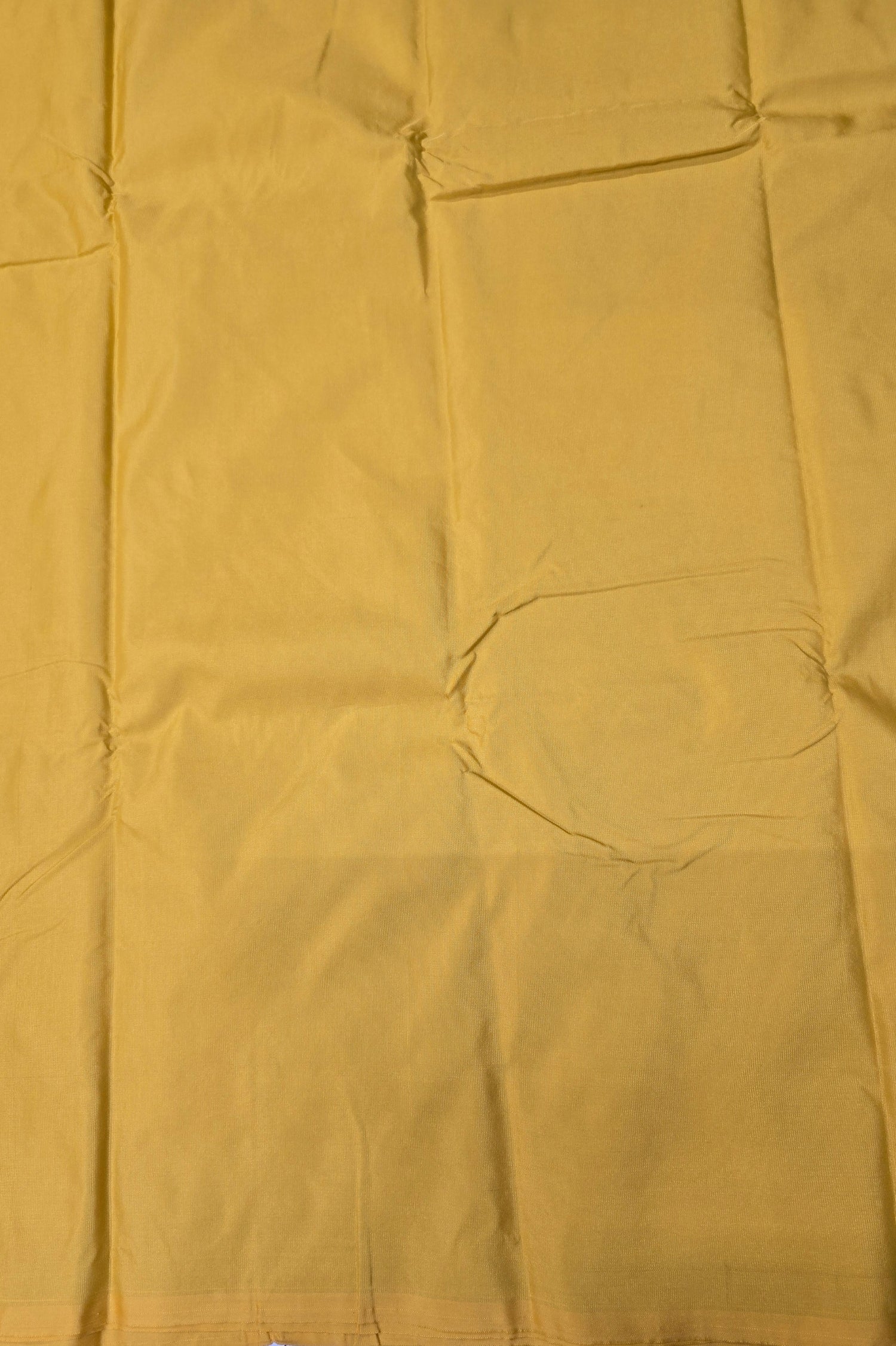 Close-up of a yellow fabric with a pocket