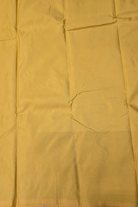 Close-up of a yellow fabric with a pocket