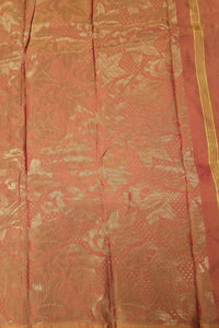 Red fabric with gold patterns and border