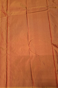 Close-up of orange fabric with visible texture