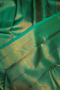 Sea Green Kanchipuram Silk Saree with Brocade Design folded to showcase intricate patterns.