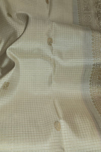 White Kanchipuram Silk Saree with Gold Border and Red Pallu