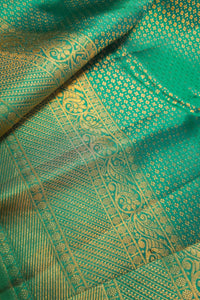 Sea Green Kanchipuram Silk Saree with Brocade Design showcasing intricate patterns and vibrant hue.