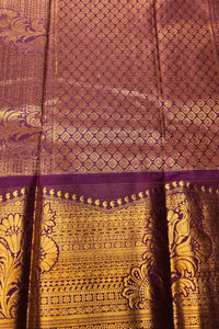 Brown and gold patterned fabric with intricate designs