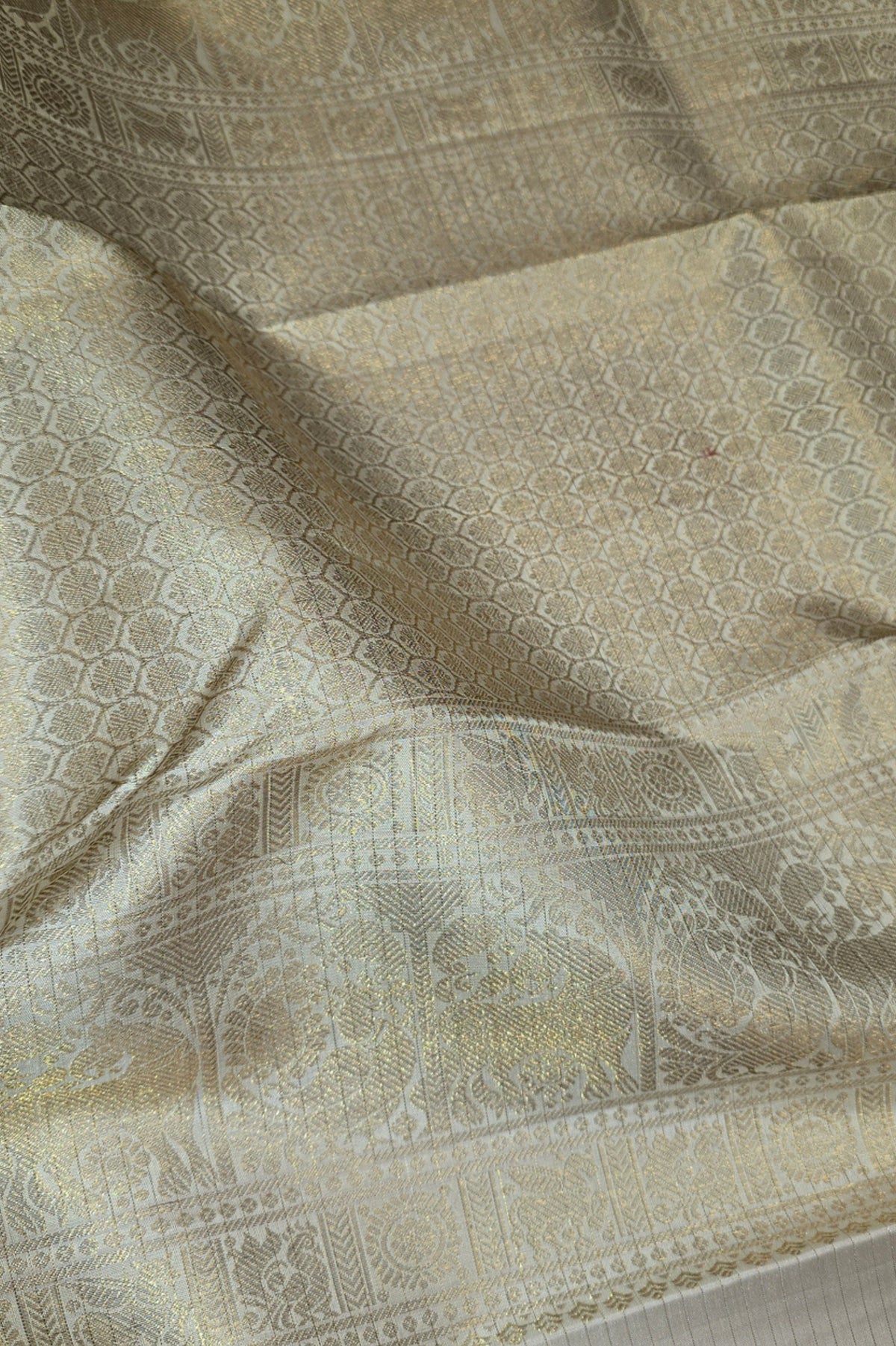 White Kanchipuram Silk Saree with Gold Border and Red Pallu
