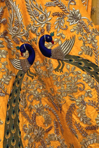 Radiant Yellow Lehenga with Exquisite Peacock Skirt Embroidery