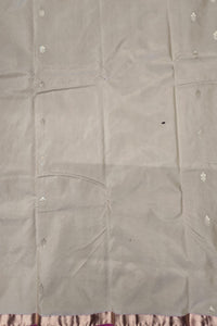 Gray fabric with floral patterns on a plain background