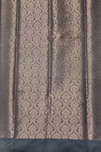 Textured fabric with a patterned design on a dark background