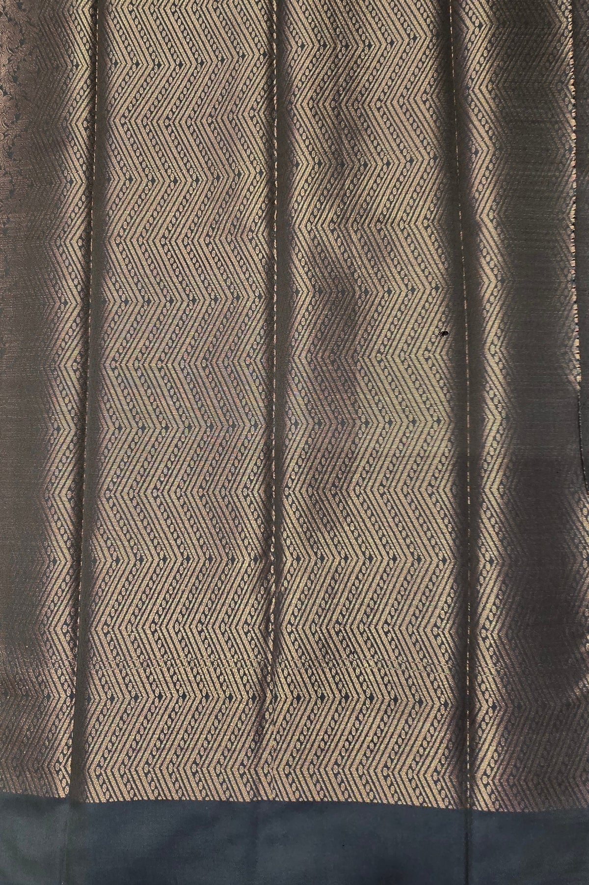 Textile with a zigzag pattern on a dark background
