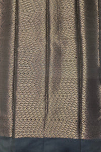 Textile with a zigzag pattern on a dark background