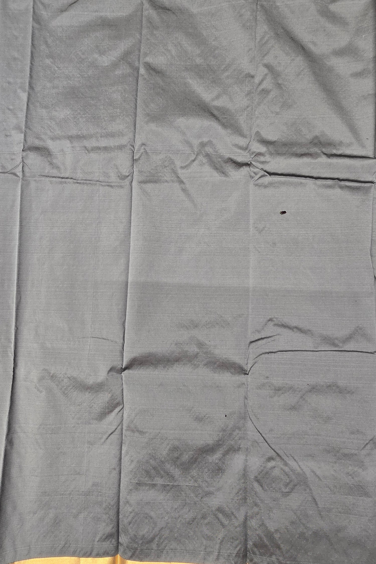 Gray fabric with a subtle pattern and yellow trim at the bottom