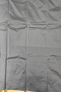 Gray fabric with a subtle pattern on a plain background