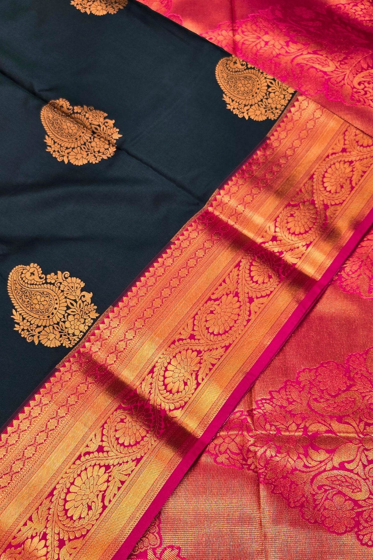 Saree with black, pink, and gold patterns