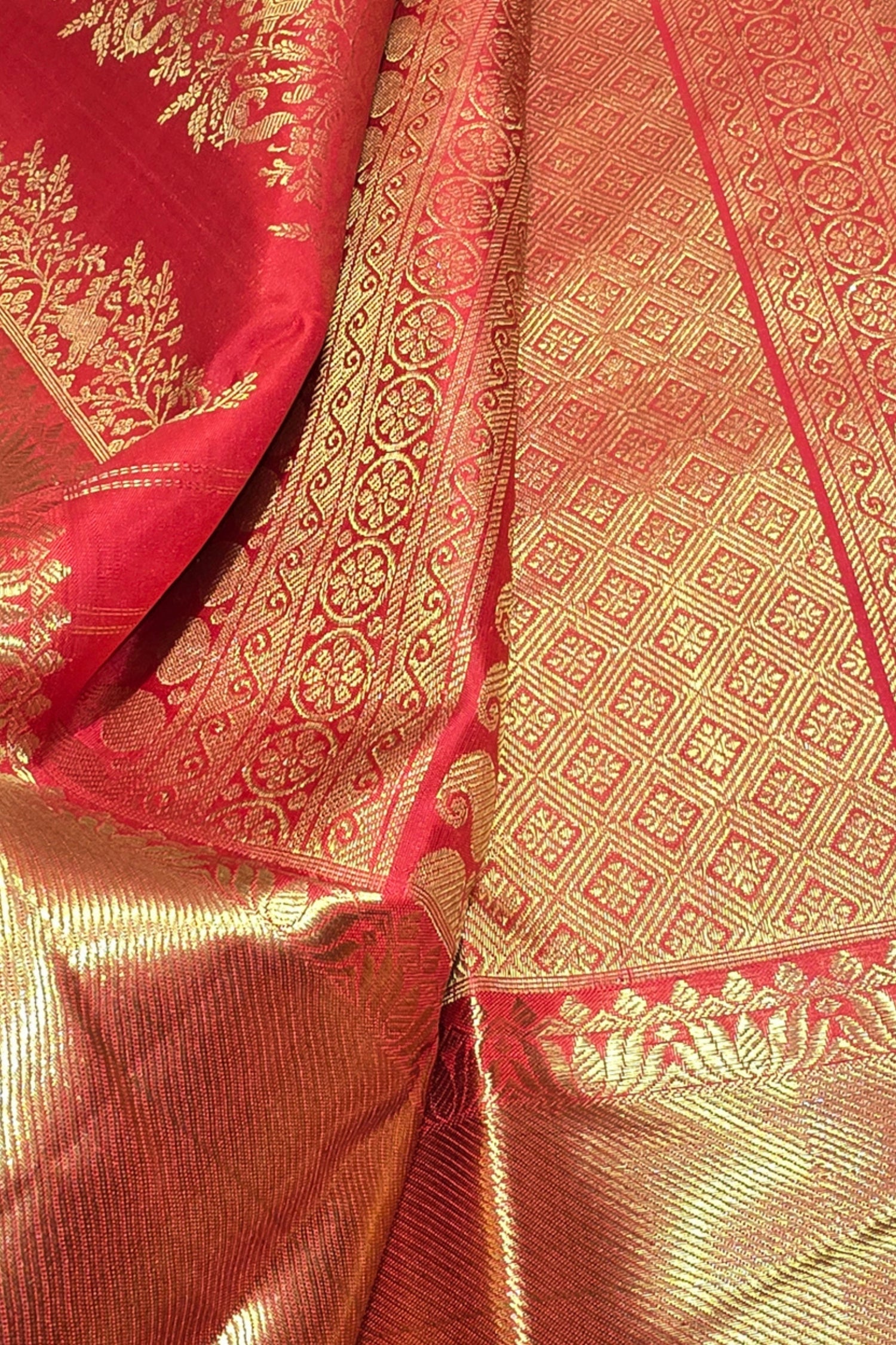 Close-up of a red and gold patterned fabric