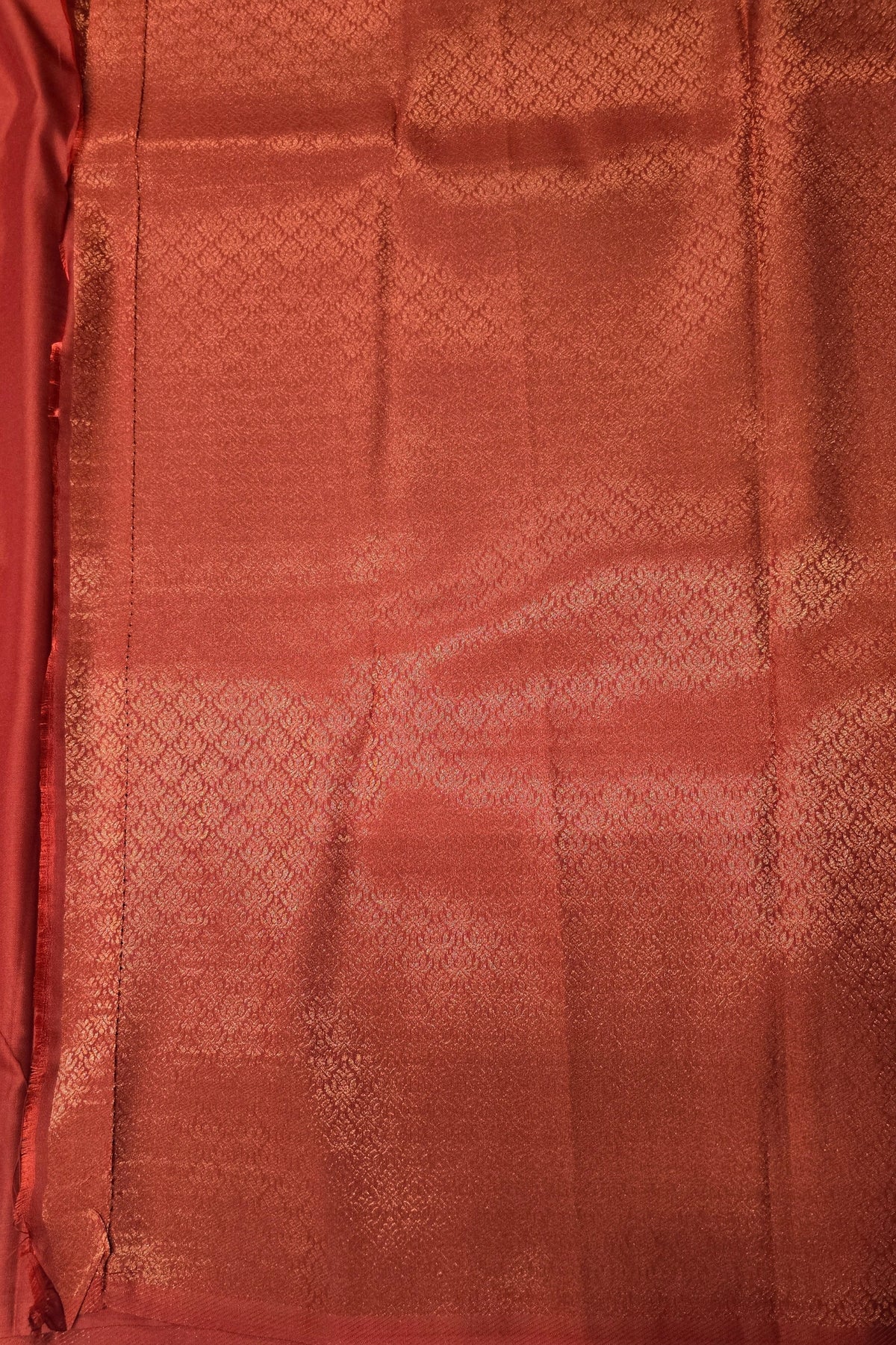 Close-up of red fabric with intricate patterns