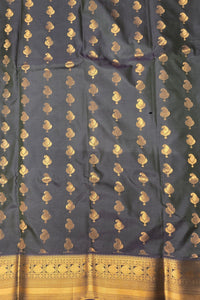 Dark blue fabric with gold floral patterns and border