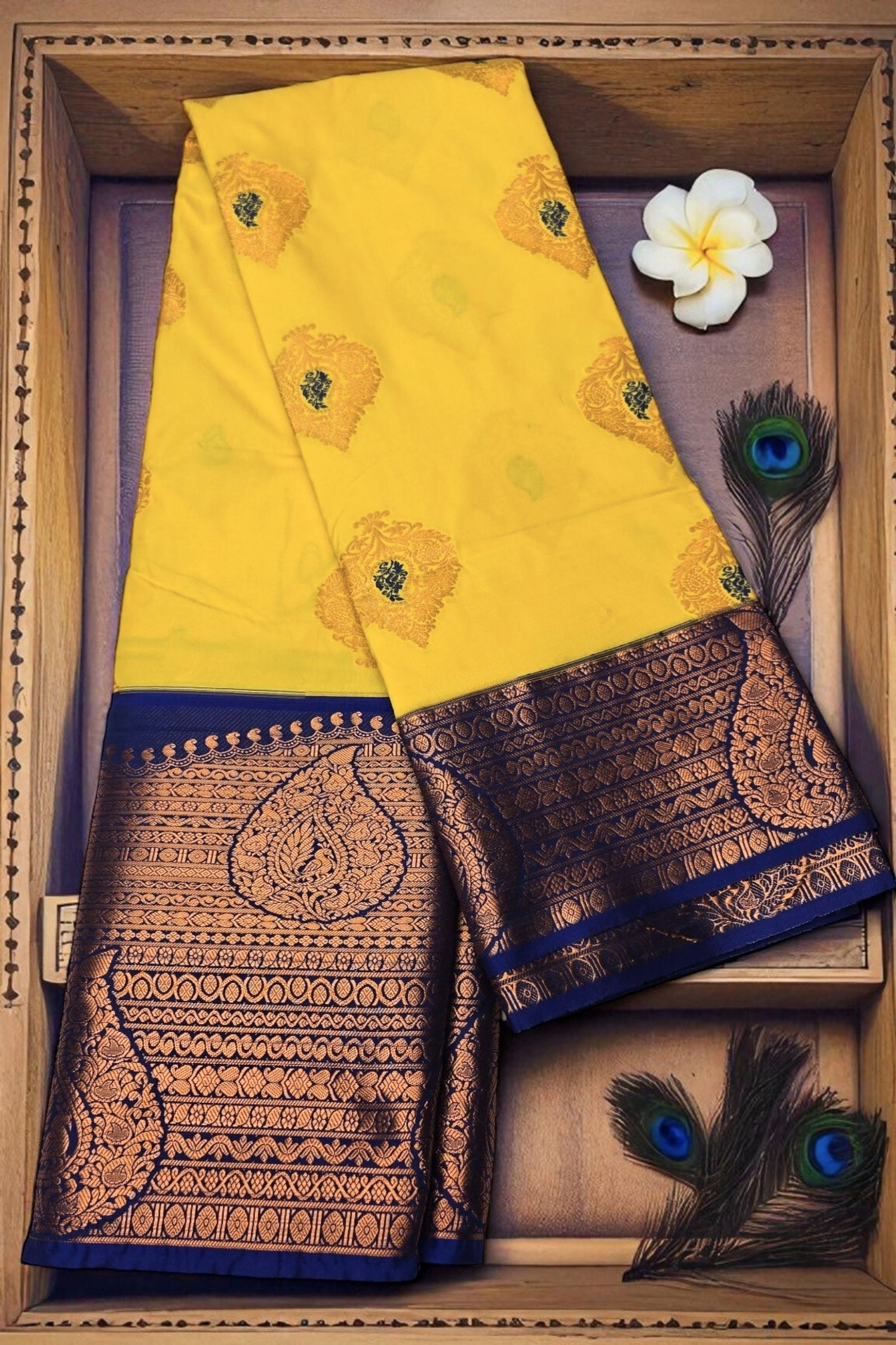 Charming Yellow Kanchipuram Silk Saree with Light Blue Border