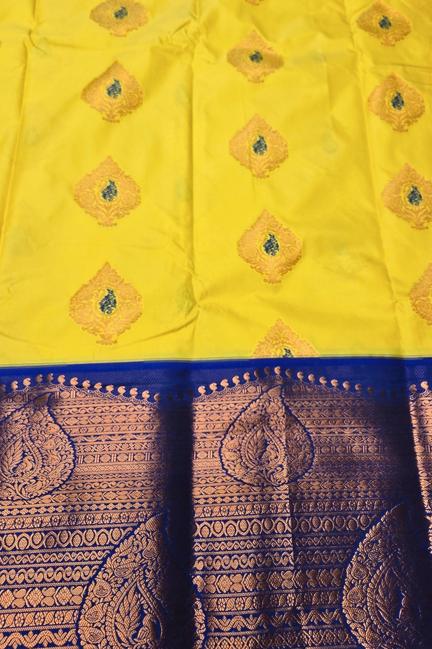 Charming Yellow Kanchipuram Silk Saree with Light Blue Border