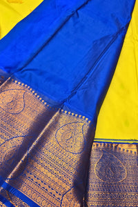 Charming Yellow Kanchipuram Silk Saree with Light Blue Border
