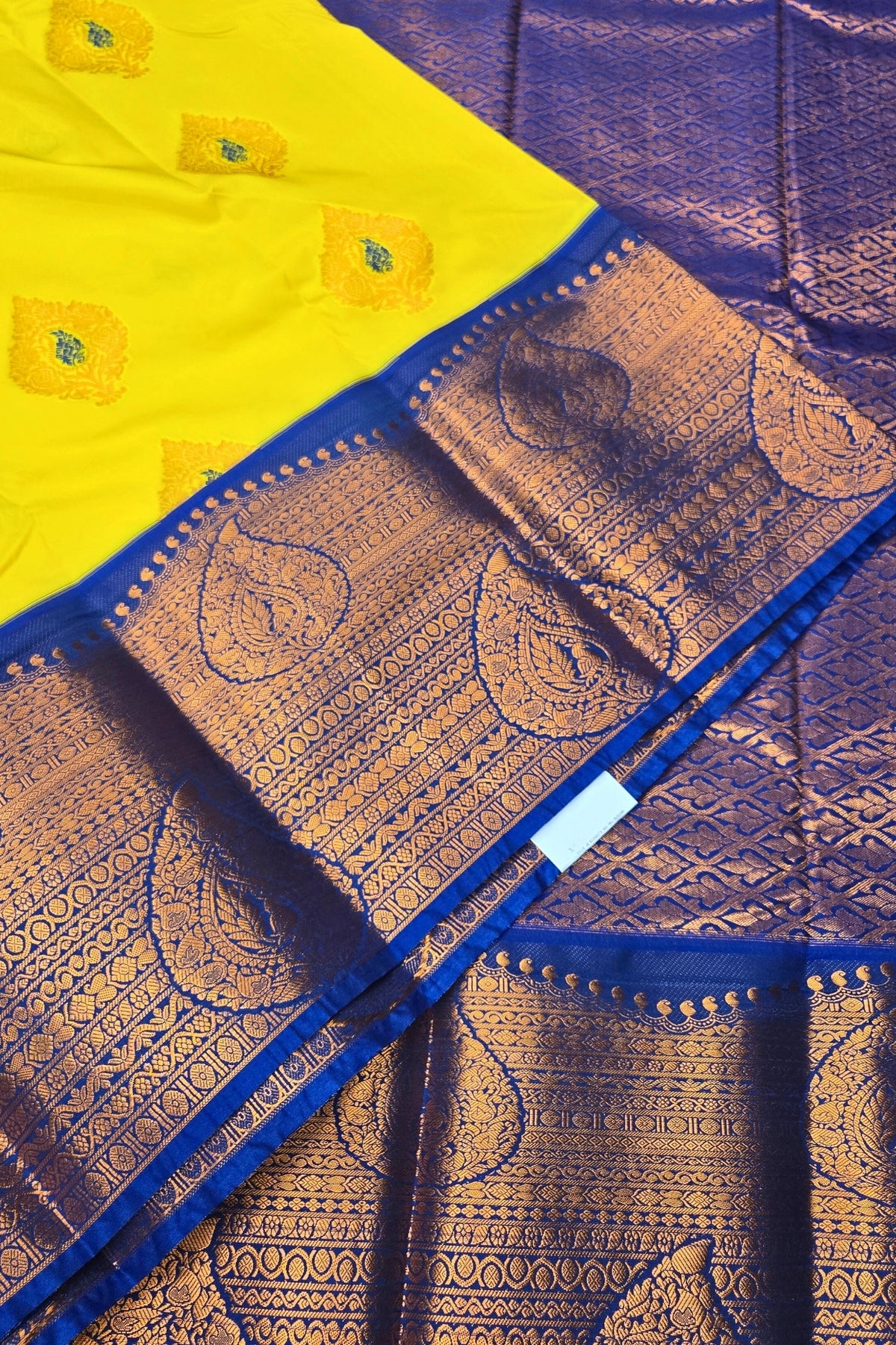 Charming Yellow Kanchipuram Silk Saree with Light Blue Border
