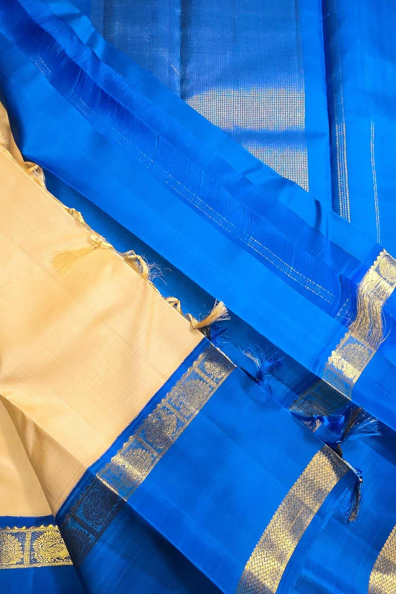 Peach Puff Kanchipuram Silk Saree with Blue Accents