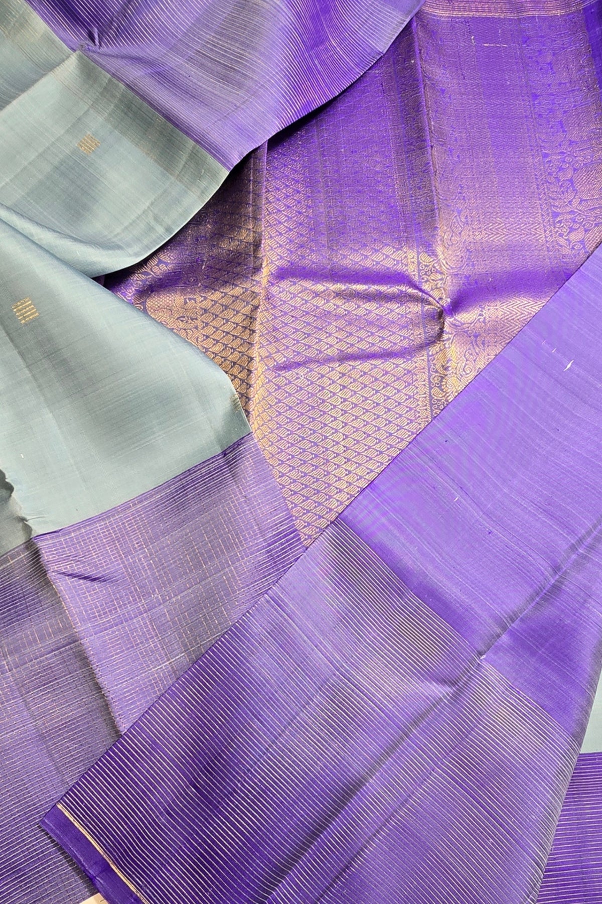 Close-up of a purple fabric with a textured pattern